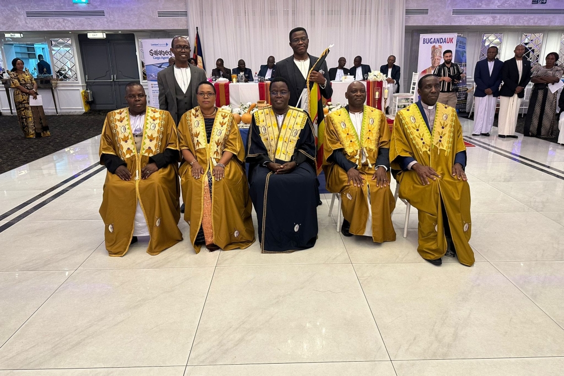 The Hon. Joseph Kawuki and the Katikkiro stand in the back, while the Kabaka’s representative and Abakungu are seated in front